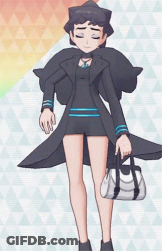 Woman In Black Coat And Shorts Holding White Bag GIF