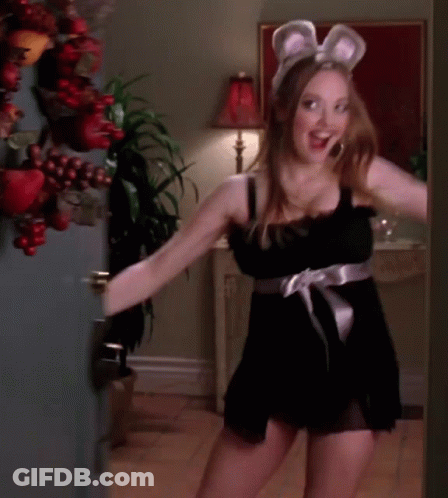 Woman In Black Dress And Mouse Ears GIF