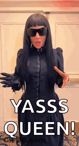 Woman In Black Dress And Sunglasses Saying Yasss Queen GIF
