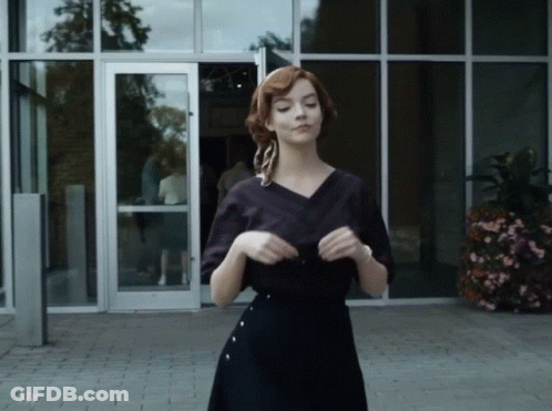 Woman In Black Dress At A & P Sign GIF