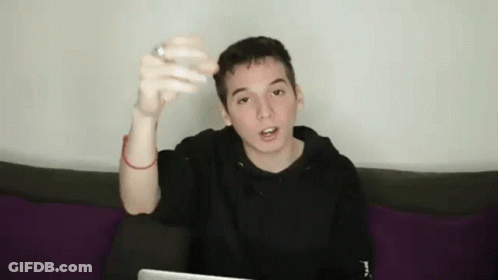 Woman In Black Dress At Microphone Saying Caller ID GIF