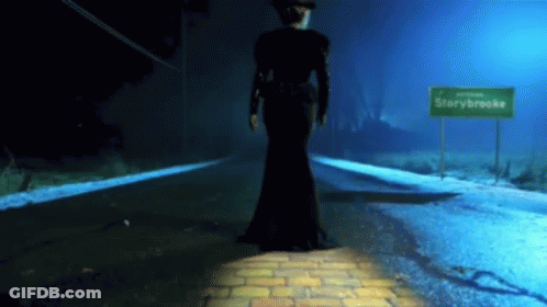 Woman In Black Dress At Starybrooke Sign GIF