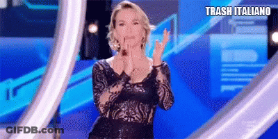 Woman In Black Dress Clapping On Stage GIF