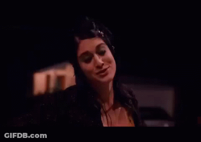 Woman In Black Dress Dancing Funny Face By House GIF