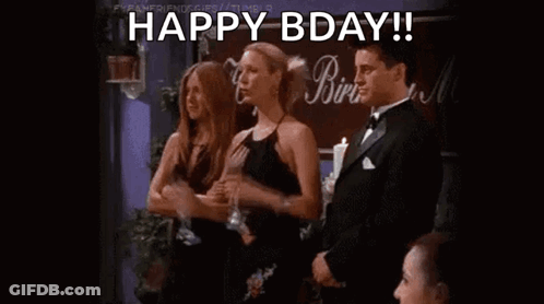Woman In Black Dress Dancing With Man In Tuxedo GIF