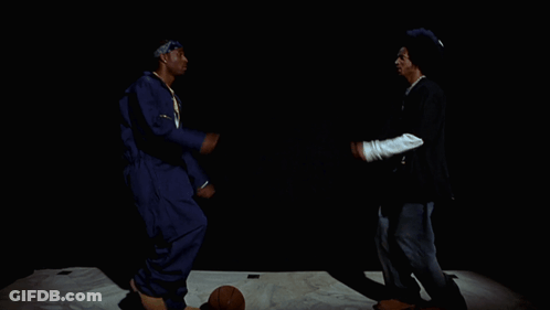 Woman In Black Dress Fist Bump Crowd GIF