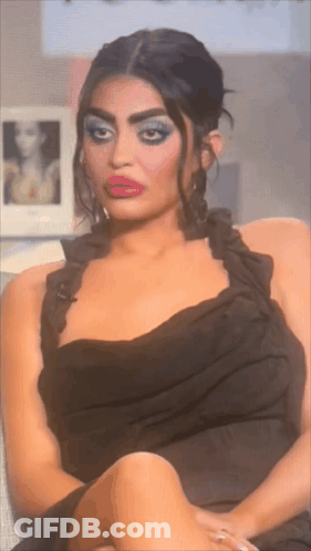 Woman In Black Dress Funny Face GIF