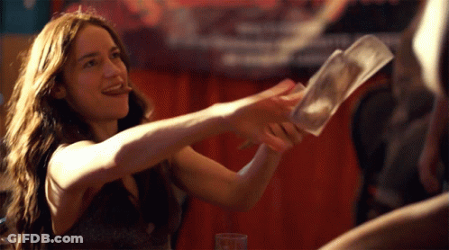 Woman In Black Dress Holding Money GIF