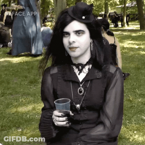 Woman In Black Dress Holding Plastic Cup GIF