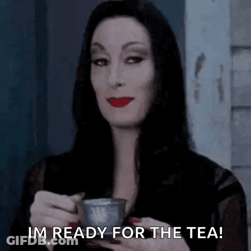 Woman In Black Dress Holding Tea Saying I'm Ready For The Tea GIF