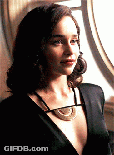 Woman In Black Dress Looking Out Window GIF