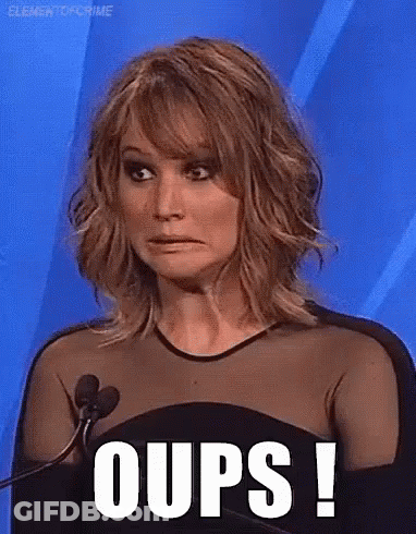 Woman In Black Dress Making Face At Microphone GIF
