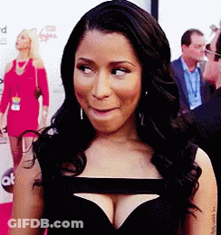 Woman In Black Dress Making Funny Face GIF