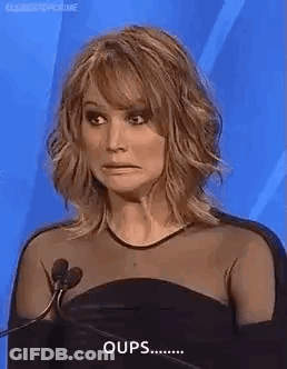 Woman In Black Dress Making Funny Face At Microphone GIF