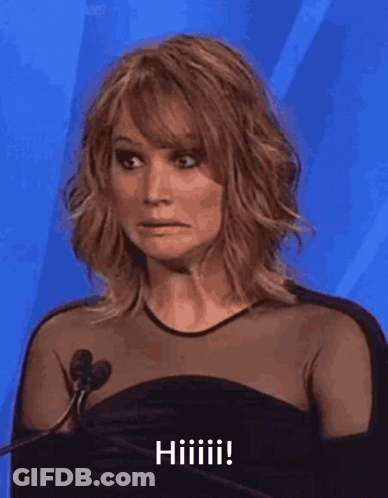 Woman In Black Dress Making Funny Face GIF
