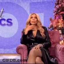 Woman In Black Dress On Pink Chair CS Sign GIF