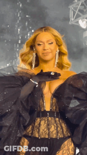 Woman In Black Dress On Stage GIF