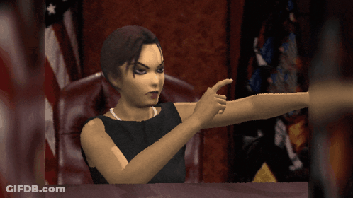 Woman In Black Dress Pointing At Table GIF