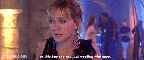 Woman In Black Dress Saying Or This Boy GIF