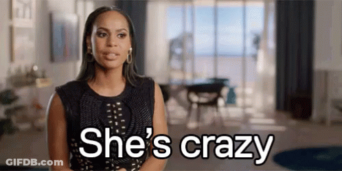 Woman In Black Dress Saying She's Crazy GIF