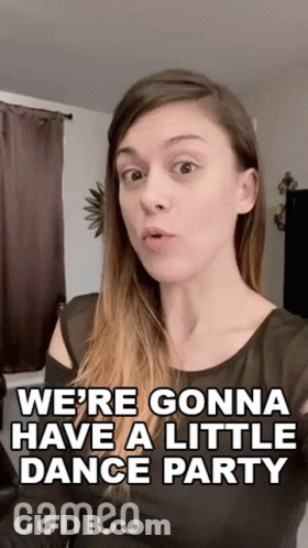 Woman In Black Dress Says Little Dance Party GIF