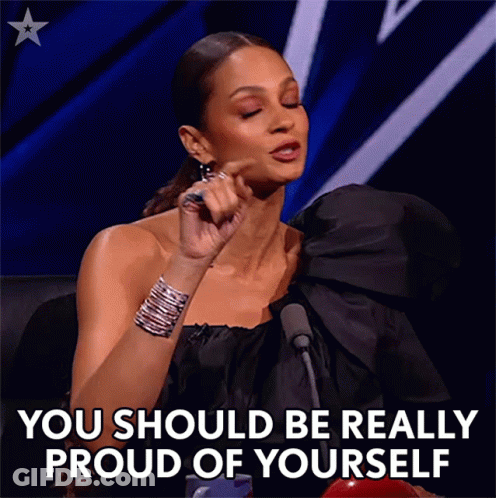 Woman In Black Dress Says You Should Be Really Proud Of Yourself GIF