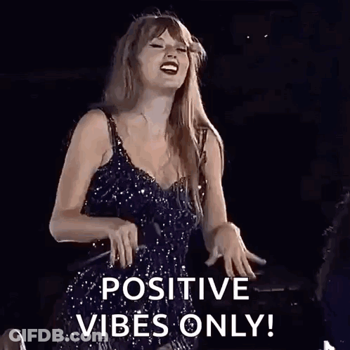 Woman In Black Dress Singing On Stage Positive Vibes Only GIF