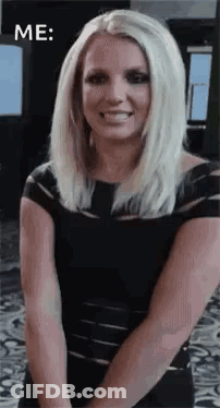 Woman In Black Dress Smiling GIF