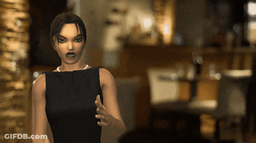 Woman In Black Dress Standing In Room GIF