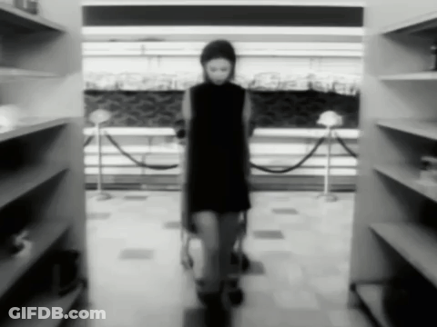 Woman In Black Dress Walking GIF