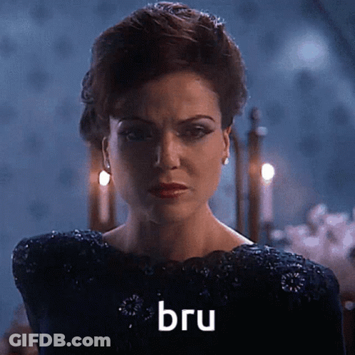 Woman In Black Dress With Bru On Face GIF