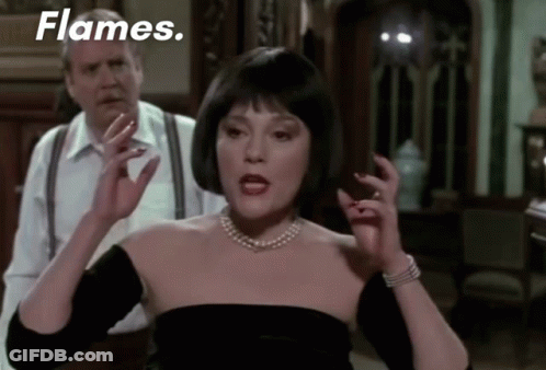 Woman In Black Dress With Flames GIF