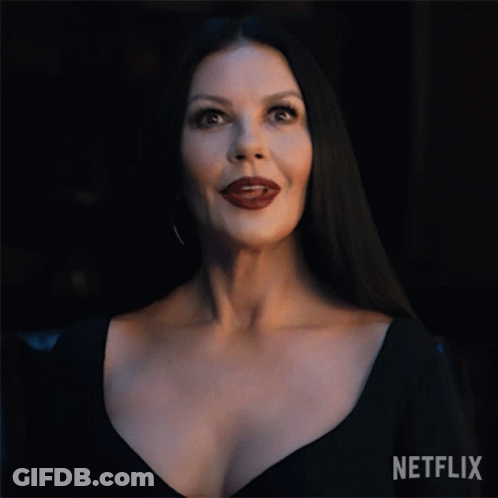 Woman In Black Dress With Netflix Logo GIF