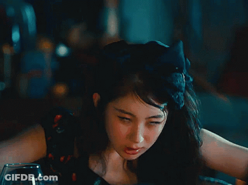 Woman In Black Dress With Red Cherries And Go Sign GIF