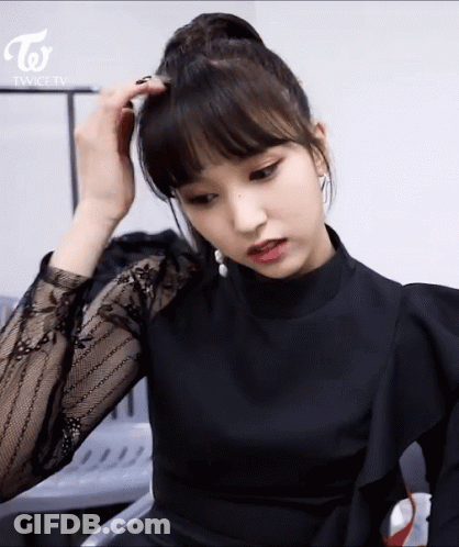 Woman In Black Dress With Twice TV Logo GIF