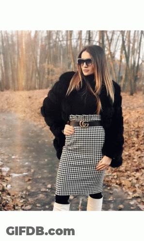 Woman In Black Fur Coat And Gucci Belt GIF