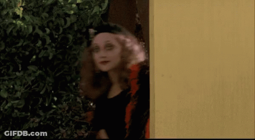 Woman In Black Hat And Earrings Says Yeth GIF