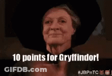 Woman In Black Hat Applauding 10 Points For Gryffindor GIF