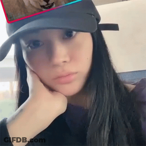 Woman In Black Hat Covering Face GIF