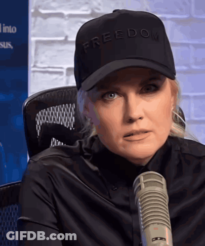 Woman In Black Hat Saying Freedom GIF