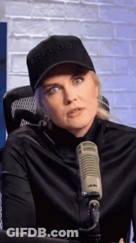 Woman In Black Hat Saying Freedom GIF