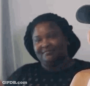 Woman In Black Hat Smiling GIF