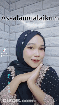 Woman In Black Hijab Saying Assalamualaikum GIF