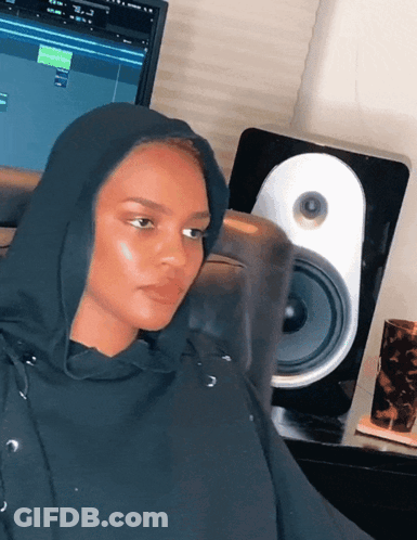 Woman In Black Hoodie Sitting At Computer GIF