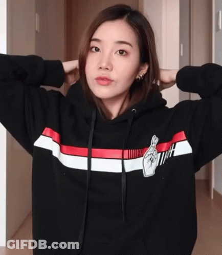Woman In Black Hoodie With Red White Blue Stripe GIF