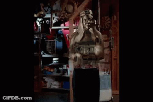 Woman In Black Jacket And White Shirt Standing In Room GIF