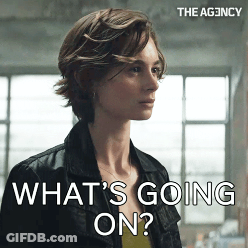 Woman In Black Jacket Asking What's Going On GIF