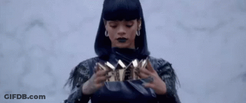 Woman In Black Jacket Holding Purse GIF
