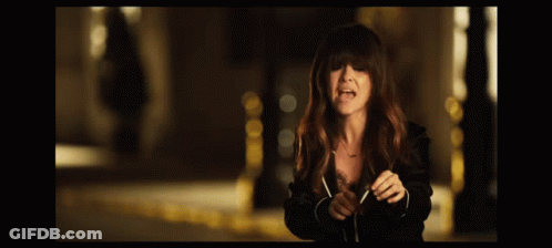 Woman In Black Jacket Laughing GIF