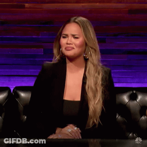 Woman In Black Jacket Making Funny Face GIF
